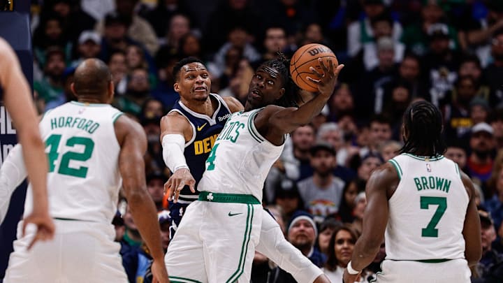 Jan 7, 2025; Denver, Colorado, USA; Boston Celtics guard Jrue Holiday (4) and Denver Nuggets guard Russell Westbrook (4) battle for the ball as center Al Horford (42) and guard Jaylen Brown (7) in the third quarter at Ball Arena. Mandatory Credit: Isaiah J. Downing-Imagn Images Jan 7, 2025; Denver, Colorado, USA; Boston Celtics guard Jrue Holiday (4) and Denver Nuggets guard Russell Westbrook (4) battle for the ball as center Al Horford (42) and guard Jaylen Brown (7) in the third quarter at Ball Arena. Mandatory Credit: Isaiah J. Downing-Imagn Images