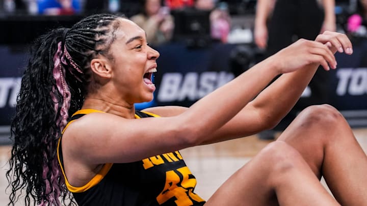 Iowa Hawkeyes forward Hannah Stuelke (45) celebrates drawing a foul Friday, March 7, 2025, in a quarterfinals game at the 2025 TIAA Big Ten Women's Basketball Tournament between the Iowa Hawkeyes and the Ohio State Buckeyes at Gainbridge Fieldhouse in Indianapolis. The Buckeyes defeated the Hawkeyes, 60-59.