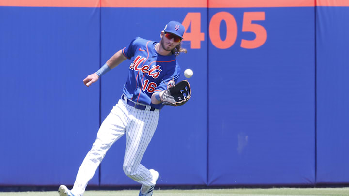 Mar 27, 2022; Port St. Lucie, Florida, USA; New York Mets center fielder Travis Jankowski fields a