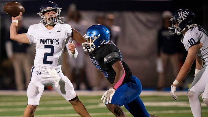 FRA's Jack Nimitz (2) gets a pass off as Antioch's Fred Ntumba (25) pressures him late in their game at Antioch High School in Antioch, Tenn., Thursday, Oct. 9, 2025.