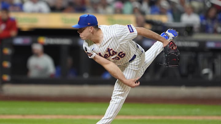 Aug 25, 2025; New York City, New York, USA; New York Mets pitcher Ryan Helsley (56) delivers a pitch against the Philadelphia Phillies during the eighth inning at Citi Field. Mandatory Credit: Gregory Fisher-Imagn Images