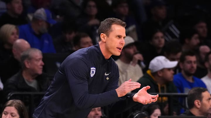 Mar 22, 2024; Brooklyn, NY, USA; Duke Blue Devils head coach John Scheyer reacts against the Vermont