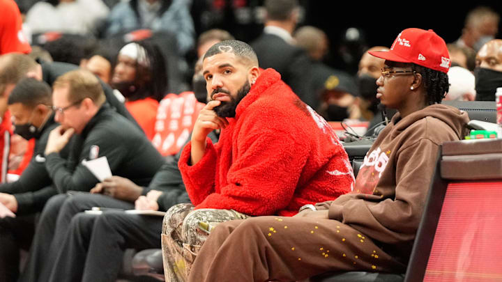 Oct 11, 2021; Toronto, Ontario, CAN; Drake looks on at a NBA game between the Houston Rockets and Toronto Raptors at Scotiabank Arena. Mandatory Credit: Kevin Sousa-Imagn Images Oct 11, 2021; Toronto, Ontario, CAN; Drake looks on at a NBA game between the Houston Rockets and Toronto Raptors at Scotiabank Arena. Mandatory Credit: Kevin Sousa-Imagn Images