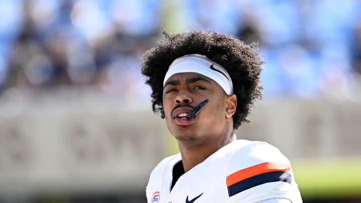 Oct 25, 2025; Chapel Hill, North Carolina, USA; Virginia Cavaliers linebacker Kam Robinson (5) on the sidelines in the first quarter at Kenan Stadium. Mandatory Credit: Bob Donnan-Imagn Images