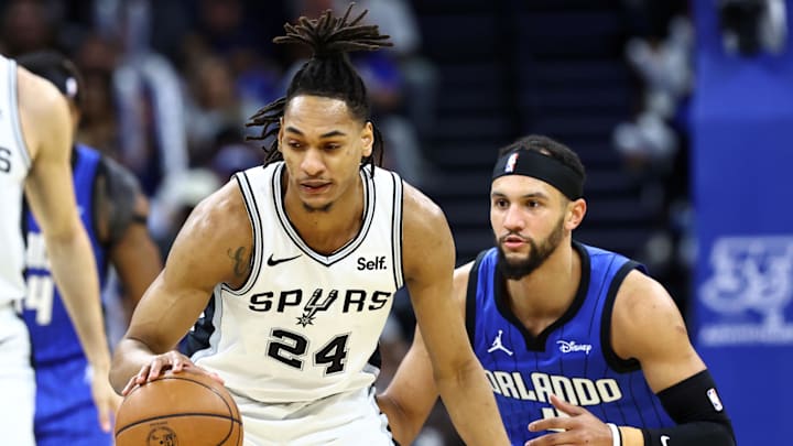 The Orlando Magic battle the San Antonio Spurs in a game between two teams succeeding without their stars and both making surprising runs up the standings within their conference.