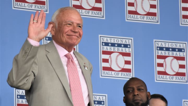 Ford Frick Award recipient Joe Castiglione waves to the crowd at the 2024 Baseball Hall of Fame induction ceremony Sunday, July 21, 2024 at the Clark Sports Center in Cooperstown, New York.