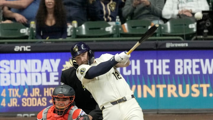 Milwaukee Brewers first base Rhys Hoskins (12) hits an RBI double during the eighth inning of their game against the Houston Astros Monday, May 5, 2025 at American Family Field in Milwaukee, Wisconsin.