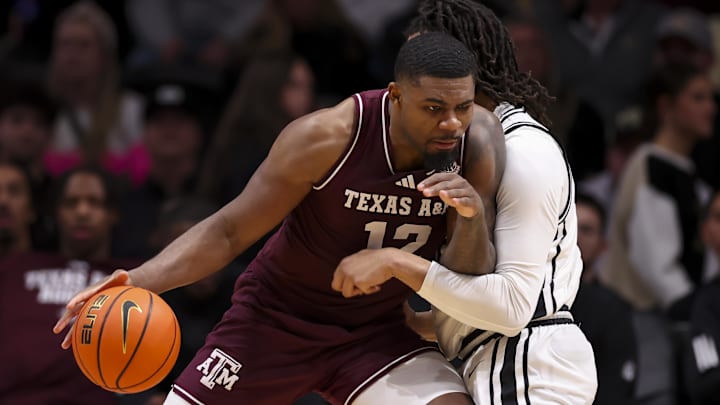 Texas A&M Aggies forward Rashaun Agee (12) backs down  Vanderbilt Commodores forward Devin McGlockton (99) during the second half at Memorial Gymnasium.