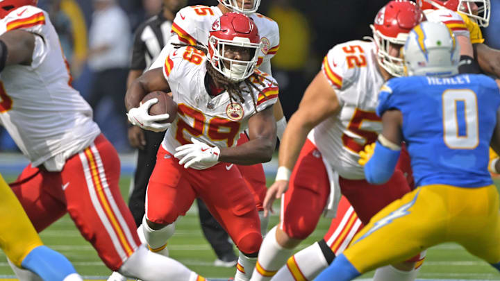 Sep 29, 2024; Inglewood, California, USA;  Kansas City Chiefs running back Kareem Hunt (29) carries the ball for a short gain in the second half against the Los Angeles Chargers at SoFi Stadium. Mandatory Credit: Jayne Kamin-Oncea-Imagn Images