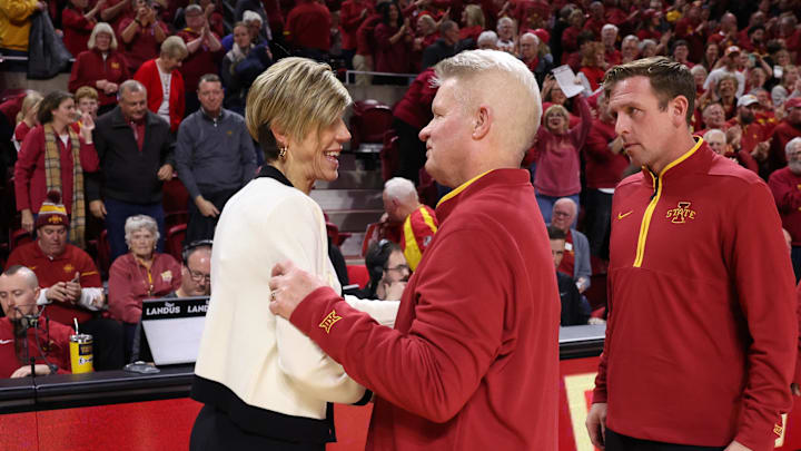 Dec 10, 2025; Ames, Iowa, USA; Iowa State Cyclones coach Bill Fennelly greets Iowa Hawkeyes coach Jan Jensen after the game at James H. Hilton Coliseum. Mandatory Credit: Reese Strickland-Imagn Images Dec 10, 2025; Ames, Iowa, USA; Iowa State Cyclones coach Bill Fennelly greets Iowa Hawkeyes coach Jan Jensen after the game at James H. Hilton Coliseum. Mandatory Credit: Reese Strickland-Imagn Images