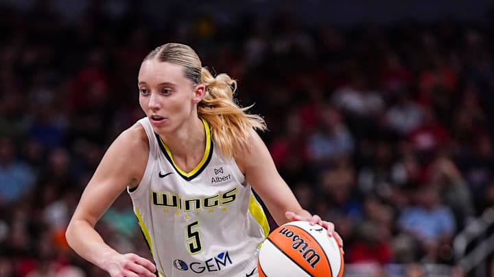 Dallas Wings guard Paige Bueckers (5) rushes up the court in a win against the Indiana Fever. Dallas Wings guard Paige Bueckers (5) rushes up the court in a win against the Indiana Fever.