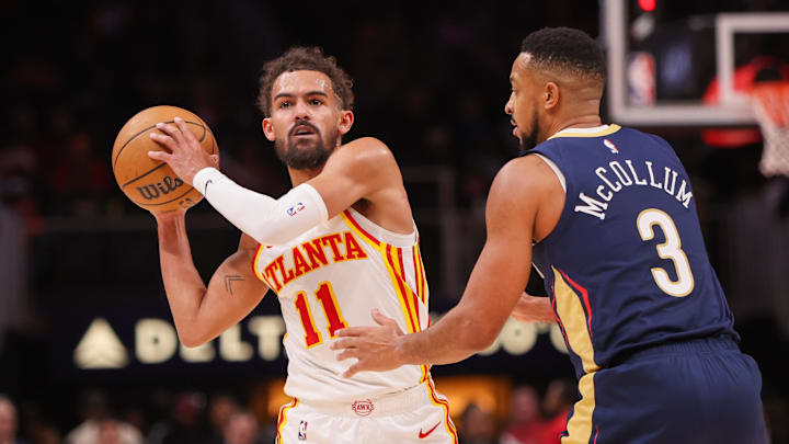 Dec 2, 2024; Atlanta, Georgia, USA; Atlanta Hawks guard Trae Young (11) is defended by New Orleans Pelicans guard CJ McCollum (3) in the second quarter at State Farm Arena. Mandatory Credit: Brett Davis-Imagn Images Dec 2, 2024; Atlanta, Georgia, USA; Atlanta Hawks guard Trae Young (11) is defended by New Orleans Pelicans guard CJ McCollum (3) in the second quarter at State Farm Arena. Mandatory Credit: Brett Davis-Imagn Images
