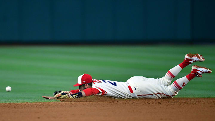 Jul 1, 2023; Anaheim, California, USA; Los Angeles Angels shortstop David Fletcher (22) misses fielding the RBI single of Arizona Diamondbacks center fielder Dominic Fletcher (8) during the sixth inning at Angel Stadium. Mandatory Credit: Gary A. Vasquez-USA TODAY Sports