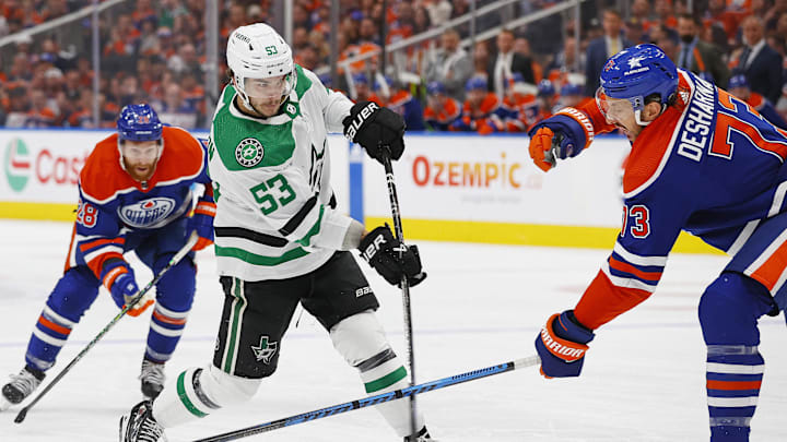 May 27, 20Dallas Stars forward Wyatt Johnson (53) tries to get a shot away in front of Edmonton Oilers defensemen Vincent Desharnais (73)