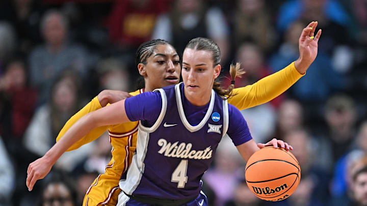 Mar 29, 2025; Spokane, WA, USA; Kansas State Wildcats guard Serena Sundell (4) controls the ball against USC Trojans guard Kennedy Smith (11) during the first half of a Sweet 16 NCAA Tournament basketball game at Spokane Arena. at Spokane Arena. Mandatory Credit: James Snook-Imagn Images