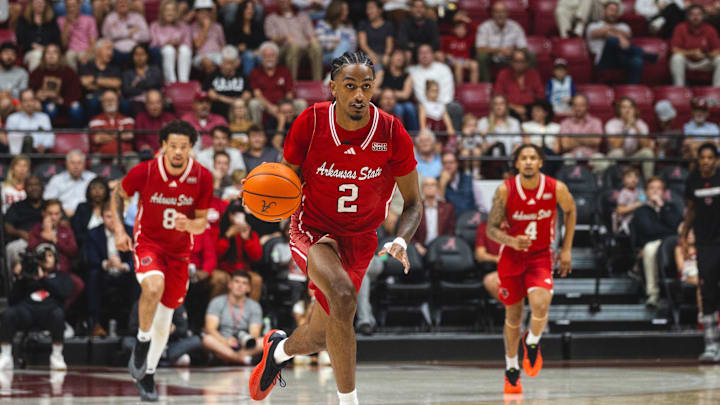 Nov 8, 2024; Tuscaloosa, Alabama, USA; Arkansas State Red Wolves forward Justin Johnson (2) drives against the Alabama Crimson Tide during the first half at Coleman Coliseum. Mandatory Credit: Will McLelland-Imagn Images