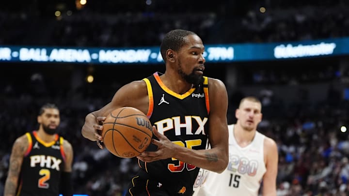 Mar 7, 2025; Denver, Colorado, USA; Phoenix Suns forward Kevin Durant (35) drives to the net in the second quarter against the Denver Nuggets at Ball Arena. Mandatory Credit: Ron Chenoy-Imagn Images Mar 7, 2025; Denver, Colorado, USA; Phoenix Suns forward Kevin Durant (35) drives to the net in the second quarter against the Denver Nuggets at Ball Arena. Mandatory Credit: Ron Chenoy-Imagn Images