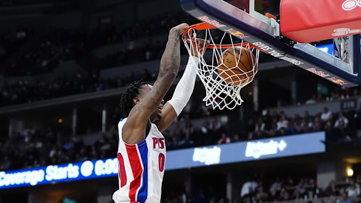 Dec 28, 2024; Denver, Colorado, USA; Detroit Pistons forward Ronald Holland II (00) dunks the ball in the second half against the Denver Nuggets at Ball Arena. Mandatory Credit: Ron Chenoy-Imagn Images