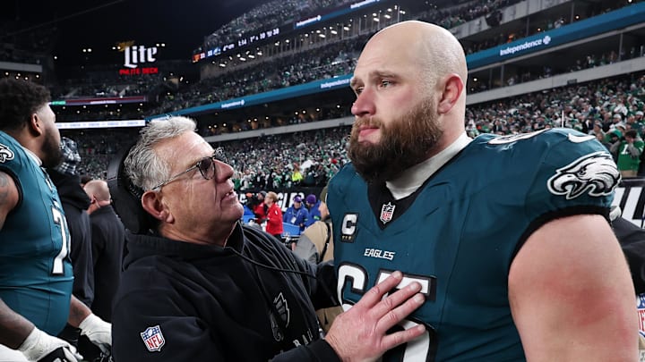 Jan 26, 2025; Philadelphia, PA, USA; Philadelphia Eagles assistant coach Jeff Stoutland (L) and offensive tackle Lane Johnson (65) in the final minute of a victory in the NFC Championship game against the Washington Commanders at Lincoln Financial Field. 
