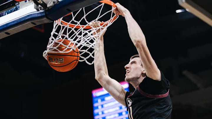 Florida State's Christian Nitu dunks against Virginia this past season. Florida State's Christian Nitu dunks against Virginia this past season.