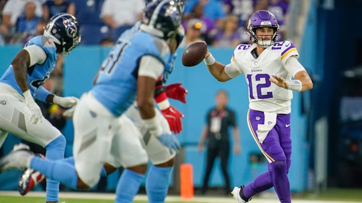 Minnesota Vikings quarterback Max Brosmer (12) looks for a receiver under pressure from the Tennessee Titans during the first quarter of an NFL pre-season game at Nissan Stadium in Nashville, Tenn., Friday, Aug. 22, 2025. Minnesota Vikings quarterback Max Brosmer (12) looks for a receiver under pressure from the Tennessee Titans during the first quarter of an NFL pre-season game at Nissan Stadium in Nashville, Tenn., Friday, Aug. 22, 2025.