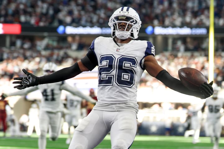 Dallas Cowboys cornerback Daron Bland returns an interception for a touchdown against the Washington Commanders Dallas Cowboys cornerback Daron Bland returns an interception for a touchdown against the Washington Commanders