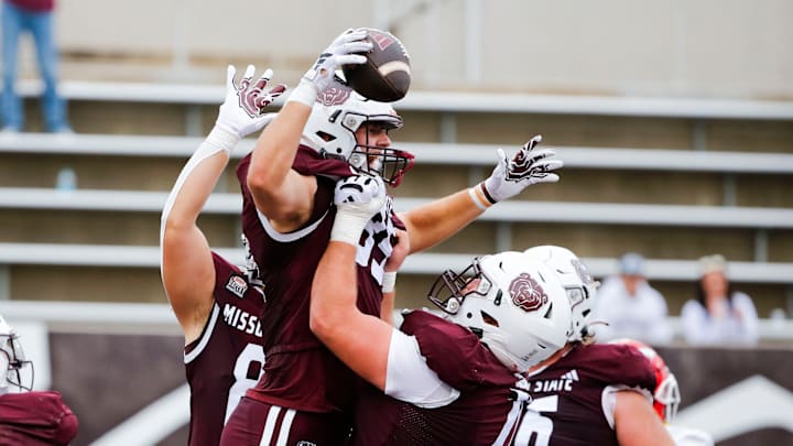 Missouri State Bears tight end Lance Mason (85) (center) is hoisted by teammates after scoring the game winning touchdown on the Youngstown State Penguins at Plaster Stadium on Saturday, Sept. 28, 2024.