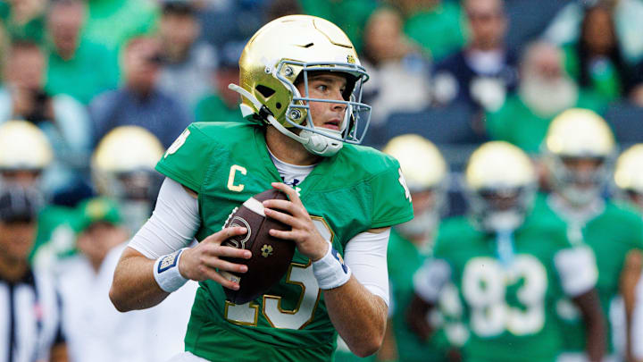 Notre Dame quarterback Riley Leonard looks for an open receiver during a NCAA college football game between Notre Dame and Louisville at Notre Dame Stadium on Saturday, Sept. 28, 2024, in South Bend.