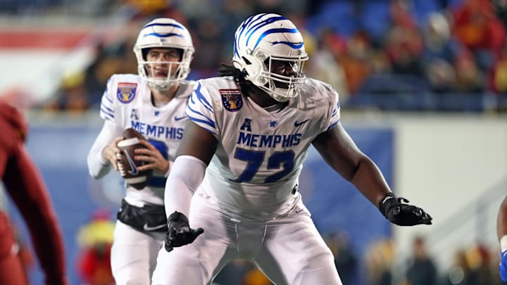 Dec 29, 2023; Memphis, TN, USA; Memphis Tigers offensive linemen Malachi Breland (72) blocks during the second half against the Iowa State Cyclones at Simmons Bank Liberty Stadium. Mandatory Credit: Petre Thomas-Imagn Images
