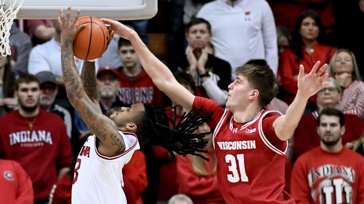 Feb 7, 2026; Bloomington, Indiana, USA; Wisconsin Badgers forward Nolan Winter (31) blocks Indiana Hoosiers guard Lamar Wilkerson (3) during the second half at Simon Skjodt Assembly Hall. Feb 7, 2026; Bloomington, Indiana, USA; Wisconsin Badgers forward Nolan Winter (31) blocks Indiana Hoosiers guard Lamar Wilkerson (3) during the second half at Simon Skjodt Assembly Hall.