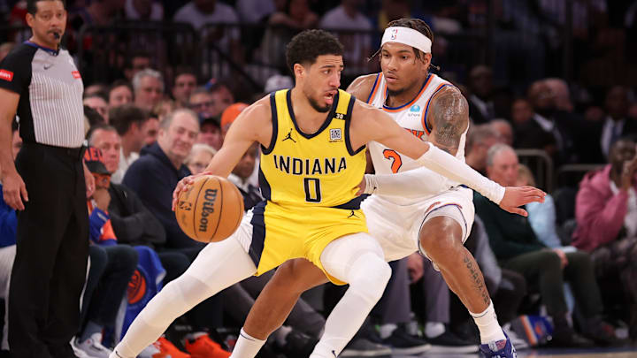 Indiana Pacers guard Tyrese Haliburton controls the ball against New York Knicks guard Miles McBride. Indiana Pacers guard Tyrese Haliburton controls the ball against New York Knicks guard Miles McBride.