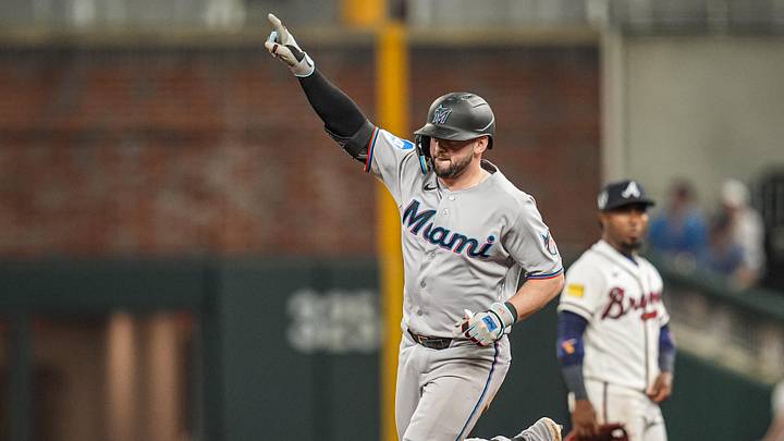 Miami Marlins catcher Liam Hicks (34) runs and reacts after hitting a two run home run Miami Marlins catcher Liam Hicks (34) runs and reacts after hitting a two run home run