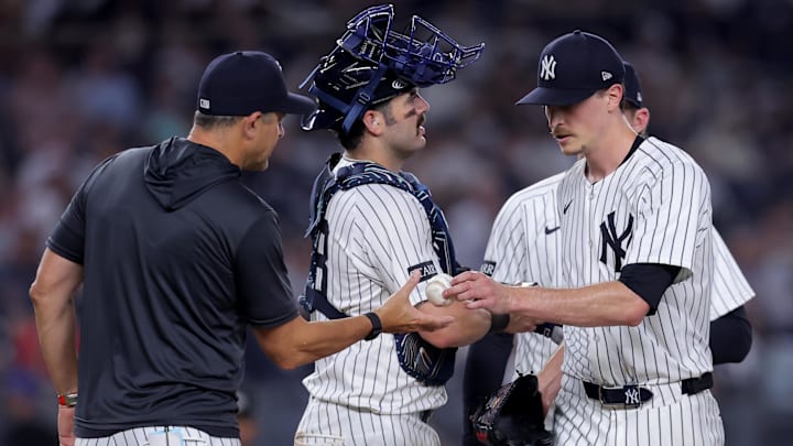 Boone (left) opted to pull Fried (right) from the game in the seventh inning with the lefthander sitting on 102 pitches. 