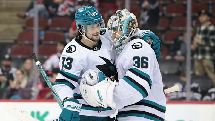 Dec 1, 2023; Newark, New Jersey, USA; San Jose Sharks goaltender Kaapo Kahkonen (36) celebrates with