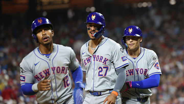 Sep 13, 2024; Philadelphia, Pennsylvania, USA; New York Mets outfielder Brandon Nimmo (9) celebrates with third base Mark Vientos (27) and shortstop Francisco Lindor (12) after hitting a three run home run during the fifth inning against the Philadelphia Phillies at Citizens Bank Park. Mandatory Credit: Bill Streicher-Imagn Images