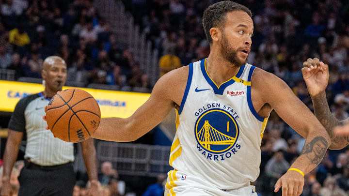 Oct 13, 2024; San Francisco, California, USA;  Golden State Warriors forward Kyle Anderson (1) dribbles the basketball against Detroit Pistons forward Ron Holland II (00) during the third quarter at Chase Center.