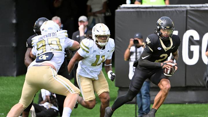 Sep 27, 2025; Winston-Salem, North Carolina, USA; Wake Forest Demon Deacons quarterback Robby Ashford (2) runs the ball against Georgia Tech Yellow Jackets defensive lineman Brayden Manley (11) during the first quarter at Allegacy Federal Credit Union Stadium. Mandatory Credit: Zachary Taft-Imagn Images Sep 27, 2025; Winston-Salem, North Carolina, USA; Wake Forest Demon Deacons quarterback Robby Ashford (2) runs the ball against Georgia Tech Yellow Jackets defensive lineman Brayden Manley (11) during the first quarter at Allegacy Federal Credit Union Stadium. Mandatory Credit: Zachary Taft-Imagn Images