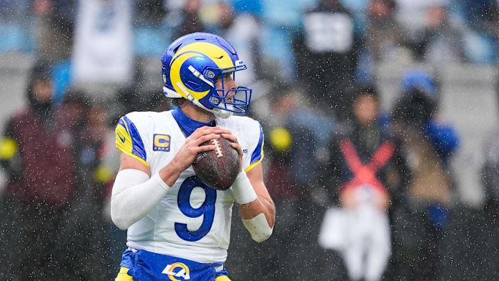 Nov 30, 2025; Charlotte, North Carolina, USA; Los Angeles Rams quarterback Matthew Stafford (9) looks to pass during the fourth quarter against the Carolina Panthers at Bank of America Stadium. Mandatory Credit: Jim Dedmon-Imagn Images