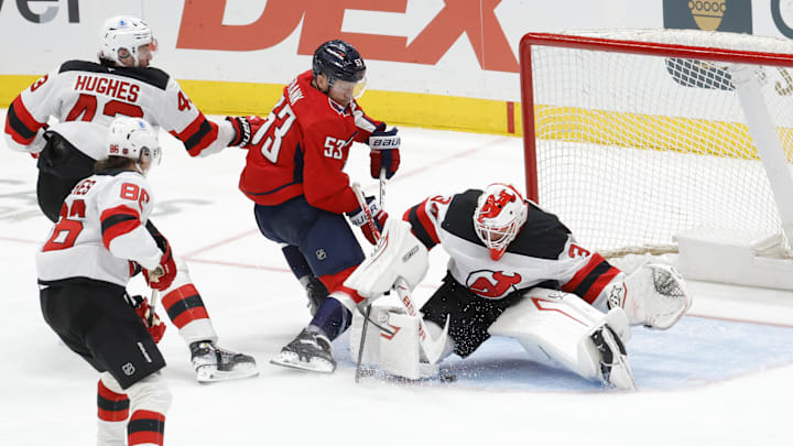 Mar 20, 2026; Washington, District of Columbia, USA; Washington Capitals right wing Ethen Frank (53) shoots the puck as New Jersey Devils goaltender Jake Allen (34) defends during the third period at Capital One Arena. Mandatory Credit: Amber Searls-Imagn Images