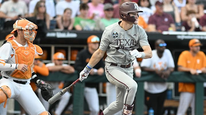 Jun 22, 2024; Omaha, NE, USA;  Texas A&M Aggies left fielder Caden Sorrell (13) drives in a run against the Tennessee Volunteers during the first inning at Charles Schwab Field Omaha. Mandatory Credit: Steven Branscombe-Imagn Images