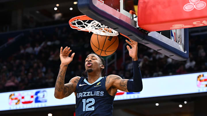Dec 28, 2025; Washington, District of Columbia, USA; Memphis Grizzlies guard Ja Morant (12) dunks the ball against the Washington Wizards during the first half at Capital One Arena. Mandatory Credit: Brad Mills-Imagn Images Dec 28, 2025; Washington, District of Columbia, USA; Memphis Grizzlies guard Ja Morant (12) dunks the ball against the Washington Wizards during the first half at Capital One Arena. Mandatory Credit: Brad Mills-Imagn Images