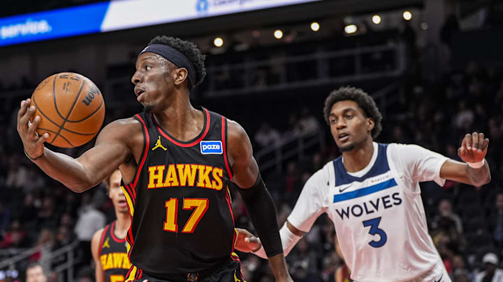 Dec 31, 2025; Atlanta, Georgia, USA; Atlanta Hawks forward Onyeka Okongwu (17) grabs a rebound against Minnesota Timberwolves forward Jaden McDaniels (3) during the first half at State Farm Arena. Mandatory Credit: Dale Zanine-Imagn Images Dec 31, 2025; Atlanta, Georgia, USA; Atlanta Hawks forward Onyeka Okongwu (17) grabs a rebound against Minnesota Timberwolves forward Jaden McDaniels (3) during the first half at State Farm Arena. Mandatory Credit: Dale Zanine-Imagn Images