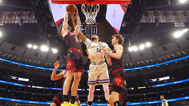 Dec 27, 2025; Chicago, Illinois, USA; Milwaukee Bucks forward Giannis Antetokounmpo (34) defends Chicago Bulls guard Josh Giddey (3) during the second half at United Center. Mandatory Credit: David Banks-Imagn Images