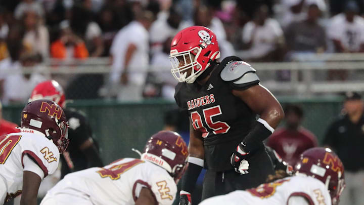 Savannah Christian's Elijah Griffin looks over the New Hampstead offense on Friday, August 23, 2024 at Pooler Stadium.