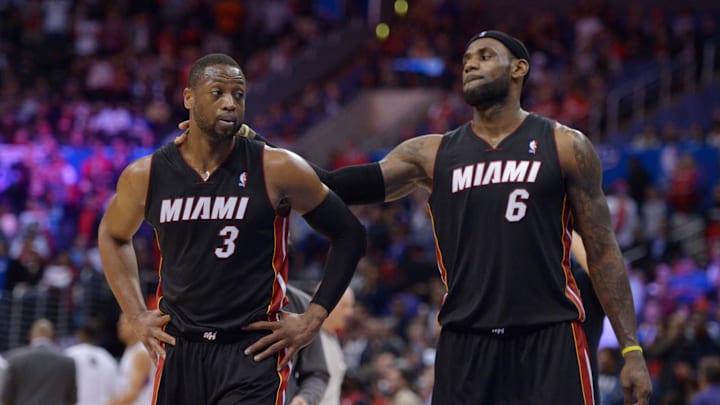 Feb 5, 2014; Los Angeles, CA, USA; Miami Heat guard Dwayne Wade (3) and forward LeBron James (6) in the fourth quarter against the Los Angeles Clippers at Staples Center. The Heat defeated the Clippers 116-112. Mandatory Credit: Kirby Lee-Imagn Images