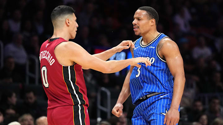 Jan 28, 2026; Miami, Florida, USA;  Orlando Magic guard Desmond Bane (3) has a few words with Miami Heat forward Simone Fontecchio (0) during the first half at Kaseya Center. Mandatory Credit: Jim Rassol-Imagn Images