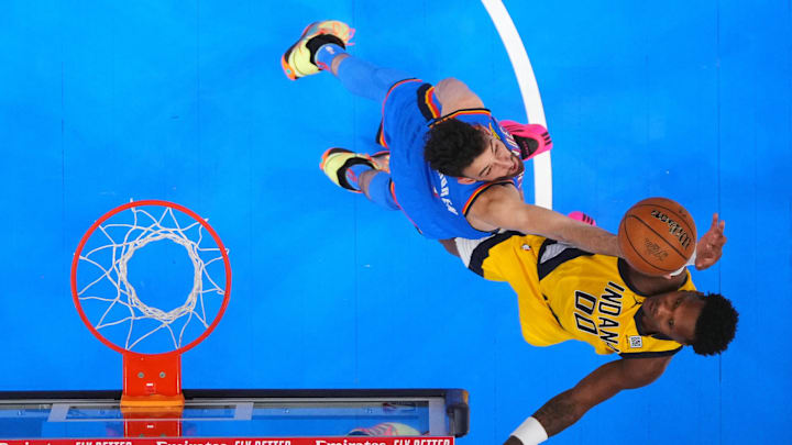 Jun 22, 2025; Oklahoma City, Oklahoma, USA; Indiana Pacers guard Bennedict Mathurin (00) shoots against Oklahoma City Thunder forward Chet Holmgren (7) during the first half during game seven of the 2025 NBA Finals at Paycom Center. Mandatory Credit: Julio Cortez-Pool Photo via Imagn Images Jun 22, 2025; Oklahoma City, Oklahoma, USA; Indiana Pacers guard Bennedict Mathurin (00) shoots against Oklahoma City Thunder forward Chet Holmgren (7) during the first half during game seven of the 2025 NBA Finals at Paycom Center. Mandatory Credit: Julio Cortez-Pool Photo via Imagn Images