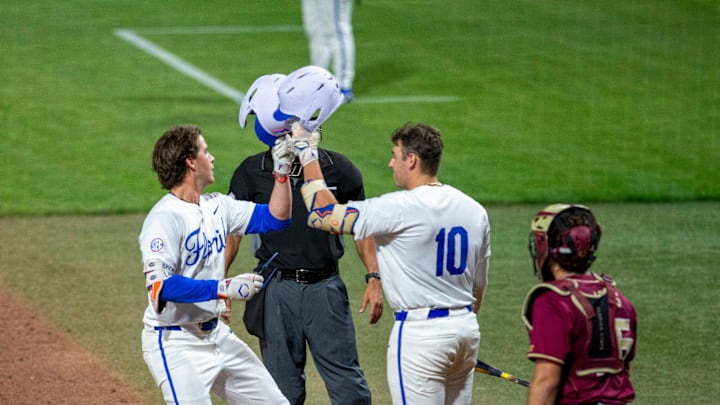 Florida infielder Brendan Lawson (11) hits his ninth homer of the season in the bottom of the sixth against FSU, March 10, 2026, at Condron Family Ballpark in Gainesville, Florida.The Gators beat the Seminoles 6-3. [Cyndi Chambers/ Gainesville Sun] 2026