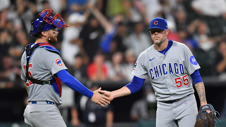 Chicago Cubs catcher Carson Kelly with pitcher Ryan Pressly