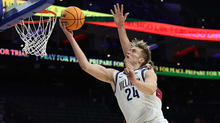 Dec 6, 2025; Philadelphia, PA, USA; Villanova Wildcats forward Duke Brennan (24) drives for a shot against the Penn Quakers during the second half at Xfinity Mobile Arena. Mandatory Credit: Bill Streicher-Imagn Images Dec 6, 2025; Philadelphia, PA, USA; Villanova Wildcats forward Duke Brennan (24) drives for a shot against the Penn Quakers during the second half at Xfinity Mobile Arena. Mandatory Credit: Bill Streicher-Imagn Images